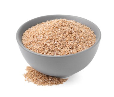 Beyaz kasedeki kuru buğday inlemeleri.