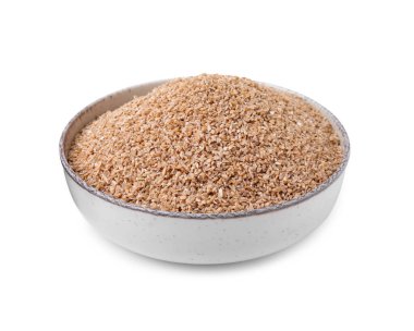 Beyaz kasedeki kuru buğday inlemeleri.