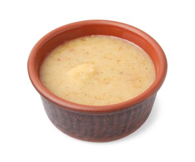 Beyaz tenceredeki lezzetli hindi sosu.