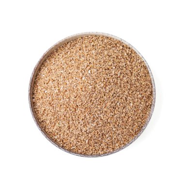 Beyaz kasede kuru buğday homurdanır.