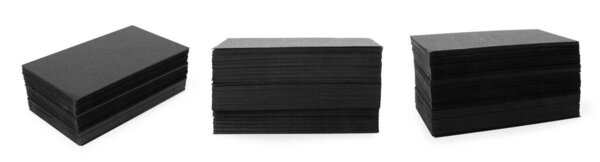 Stacked black business cards isolated on white