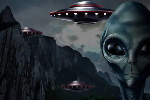 UFO. Alien and flying spaceship in mountains. Extraterrestrial invasion