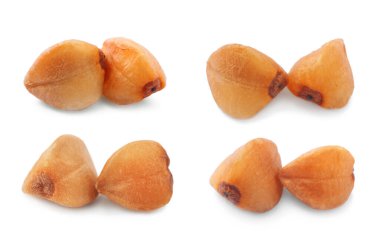 Çiğ karabuğday taneleri beyaz üzerine izole edilmiş.