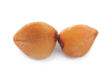 Beyaz, makro manzaralı iki karabuğday tohumu.