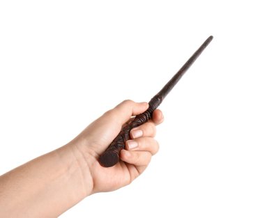 Beyaz arka planda tahta sihirli değnek tutan kadın, yakın plan.