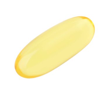 Bir sarı vitamin kapsülü beyaz, üst görünümde izole edilmiş.