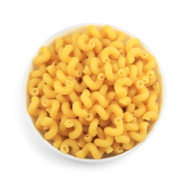 Tabakta çiğ cavatappi makarnası, beyaz, üst manzara.