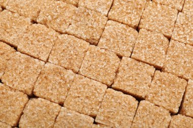 Esmer şeker küpleri arkaplan olarak, üst görünüm