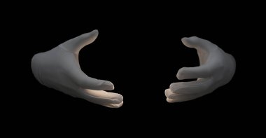 Sihirbaz siyah arkaplanda bir şey tutuyor, yakın plan.