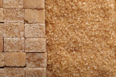 Arka plan olarak esmer şekerin farklı türleri, üst görünüm. Metin için boşluk