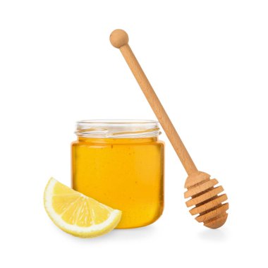 Bal cam kavanozda, limon ve balık beyazda izole edilmiş.