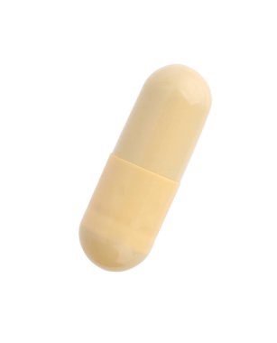 Üst görünümde izole edilmiş bir vitamin kapsülü