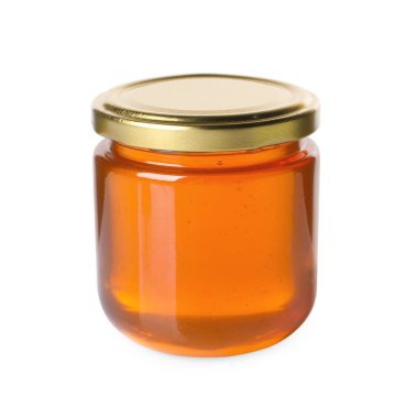 Cam kavanozdaki tatlı doğal bal beyaza izole edilmiş.