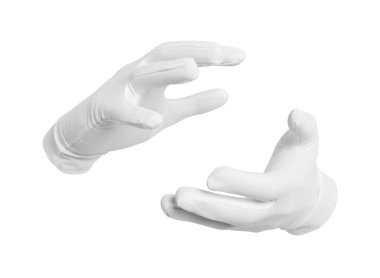 Sihirbaz beyaz arka planda bir şey tutuyor, yakın plan