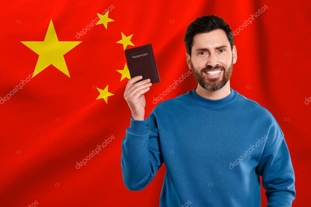 Immigration. Happy man with passport against national flag of China, space for text