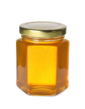 Cam kavanozdaki tatlı doğal bal beyaza izole edilmiş.