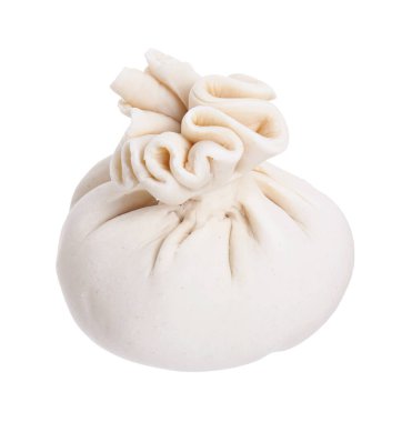 Beyaz üzerine pişmemiş khinkali (hamur tatlısı). Gürcistan mutfağı