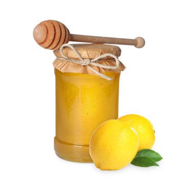 Bal cam kavanozda, limon ve balık beyazda izole edilmiş.