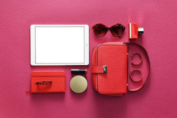 Flat lay composition with modern tablet on hot pink background. Space for text