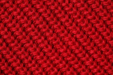 Arka plan olarak yumuşak kırmızı örülmüş kumaş dokusu, üst görünüm