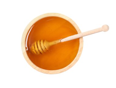 Lezzetli bal kasede ve deniz mavisi beyaz manzarada izole edilmiş.