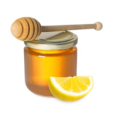 Bal cam kavanozda, limon ve balık beyazda izole edilmiş.