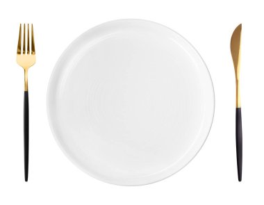 Temiz plaka, çatal ve bıçak beyaz arka planda, üst manzara