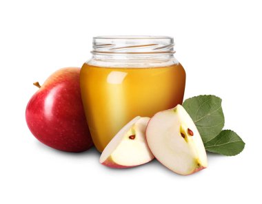 Cam kavanozda bal ve beyaz elmalar