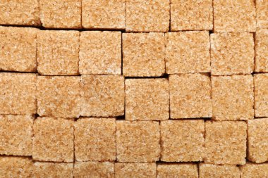 Esmer şeker küpleri arkaplan olarak, üst görünüm