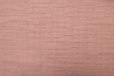 Arka plan olarak yumuşak pastel kumaşın dokusu, yakın plan