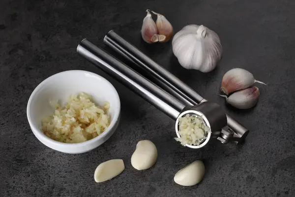 Garlic Press Cloves Mince Grey Table Kitchen Utensil — Stock Photo, Image