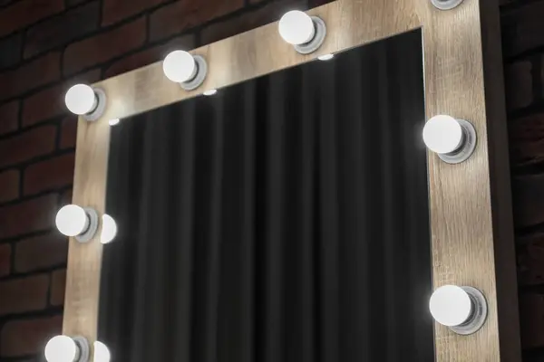 Mirror with light bulbs in makeup room