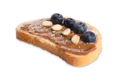 Lezzetli fındık ezmeli tost, yaban mersini ve fıstık.