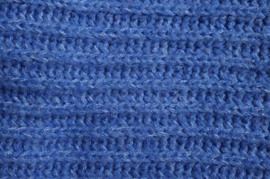 Arka plan olarak yumuşak mavi kumaşın dokusu, üst görünüm
