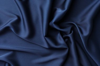 Arkaplan olarak mavi buruşmuş ipek kumaş dokusu, üst görünüm