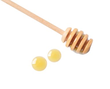 Tahta kaplama ve beyaz arka planda taze bal.