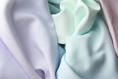 Arka plan olarak farklı buruşuk kumaşlar, üst görünüm