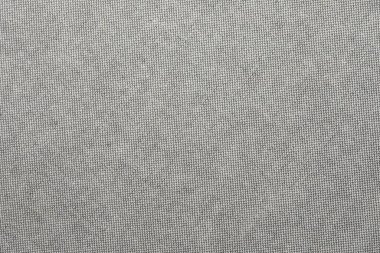 Arkaplan olarak gri kumaşın dokusu, üst görünüm