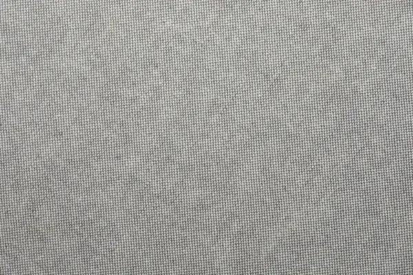 Arkaplan olarak gri kumaşın dokusu, üst görünüm