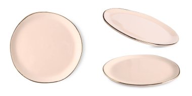 Beyaz üzerine izole edilmiş bej seramik plaka, farklı görünümlü.