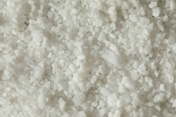 stock image Organic sea salt as background, top view