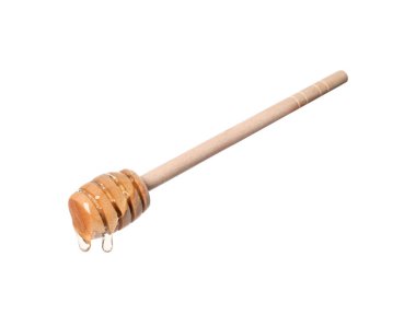 Beyaz arka planda doğal bal damlıyor.