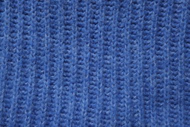 Arka plan olarak yumuşak mavi kumaşın dokusu, üst görünüm