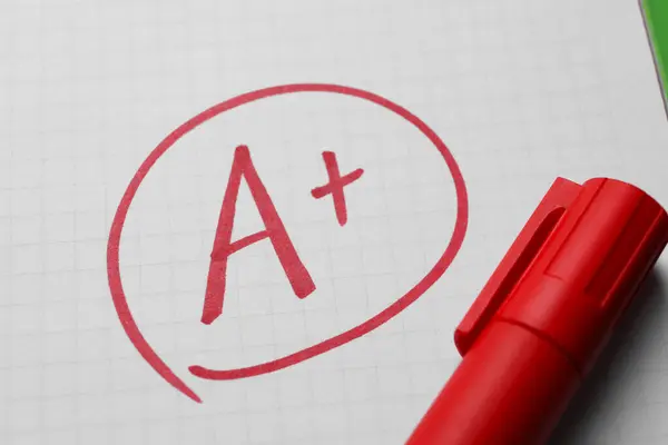 School Grade Red Letter Symbol Notebook Paper Marker Closeup — Stock Photo, Image