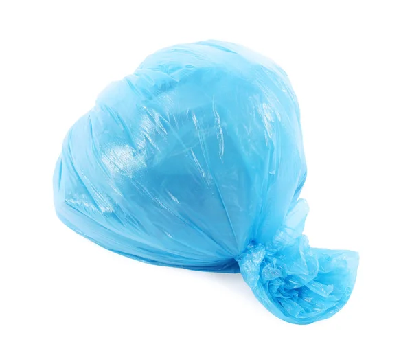 白で隔離された青いプラスチックごみ袋 — ストック写真