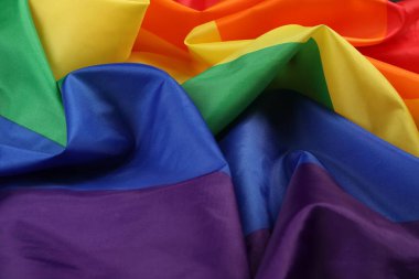 Arkaplan olarak Gökkuşağı LGBT bayrağı, yakın plan görünümü