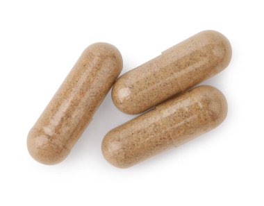 Beyaz, üst görünümde izole edilmiş vitamin kapsülleri