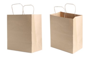 Kraft kağıt torbalar beyaz üzerinde izole sapları ile