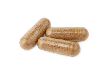 Beyaza izole edilmiş vitamin kapsülleri. Sağlık takviyeleri