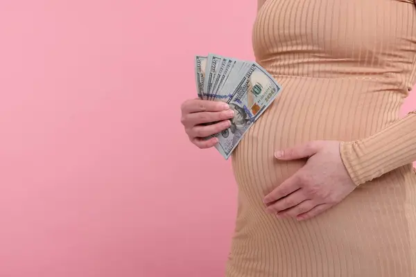 Surrogate Mother Pregnant Woman Dollar Banknotes Pink Background Closeup Space — Stock Photo, Image